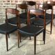 Chairs in rosewood and Scandinavian black imitation Arne Hovmand Olsen