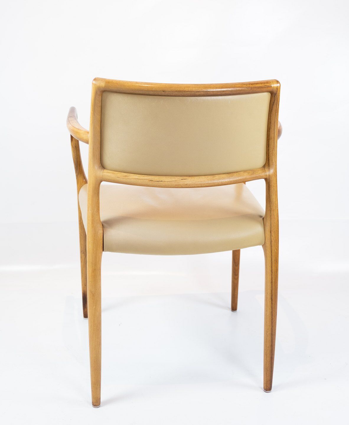 Pair of N.O. Moeller armchairs, model 65, in rosewood and light leather