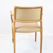 Pair of N.O. Moeller armchairs, model 65, in rosewood and light leather