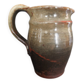Ceramic pitcher from the 20th century with a signature to be identified.