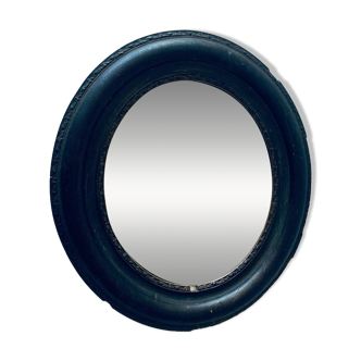 Antique black oval mirror