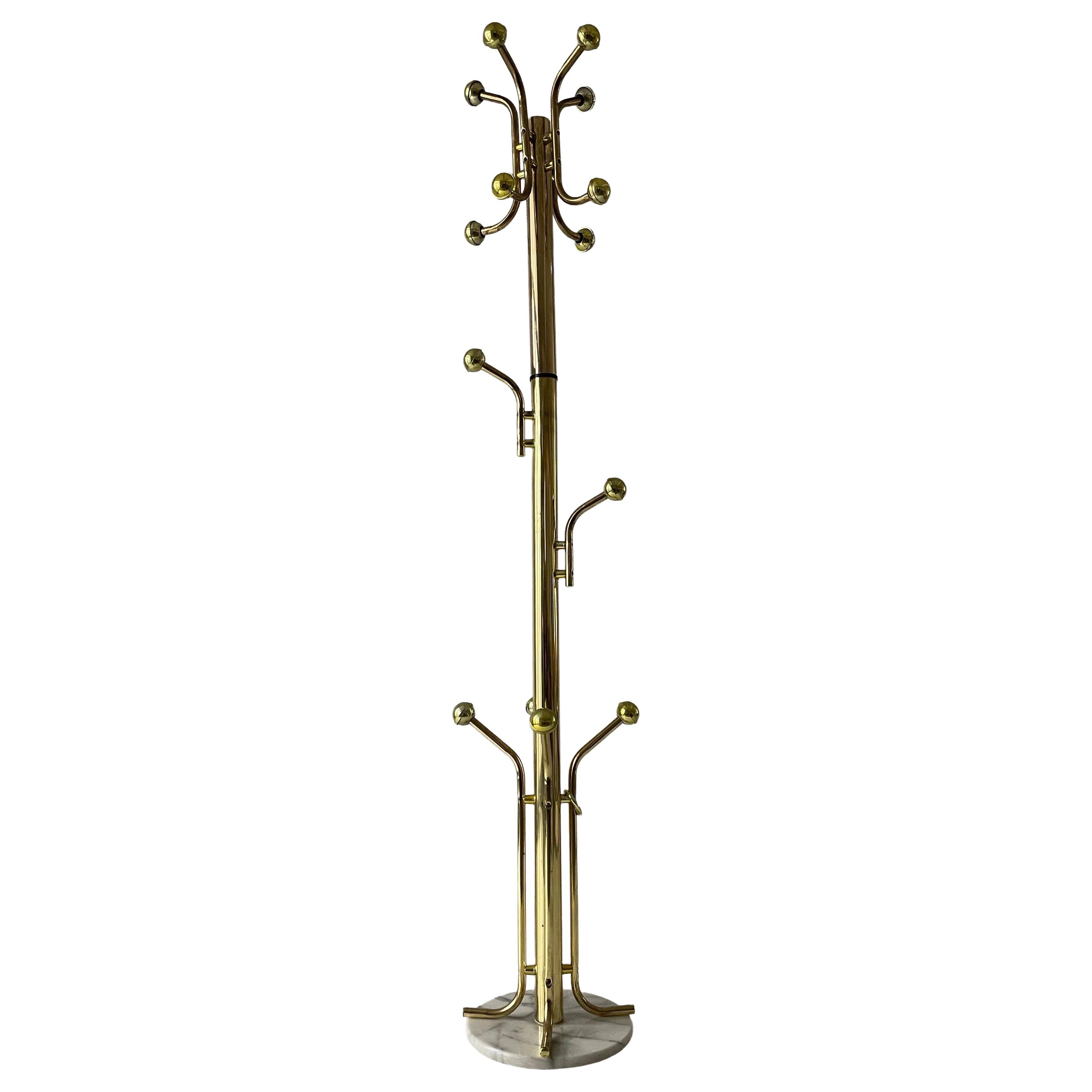 Free-standing coat rack in plexiglass with a marble base, 1960s, Germany.