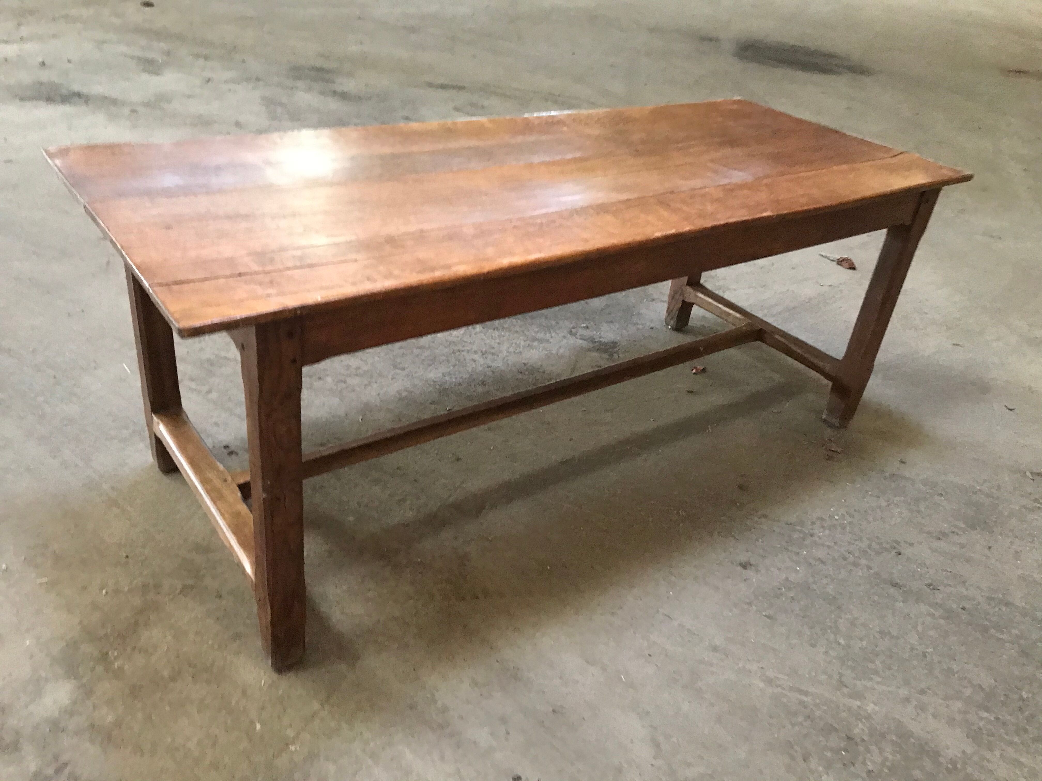 Old oak farm table in crisscross