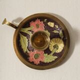 Set of 2 round golden metal candle holders and floral patterns