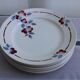 Set of 8 flat ceramic plates