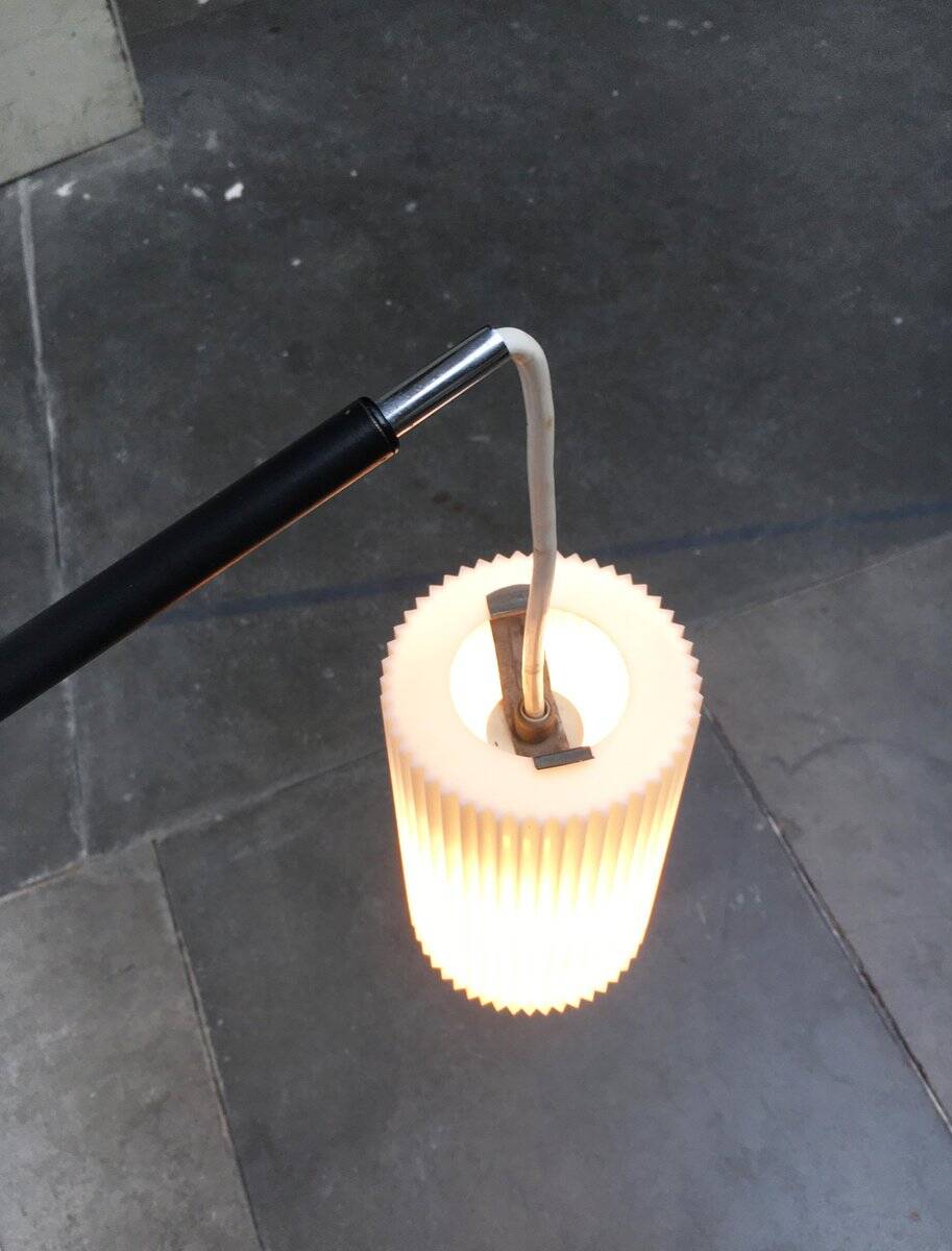Mid-century German minimalist wall lamp with cantilever arm by Erco.