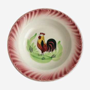 Old decoration with earthenware rooster of St Amand Hamage