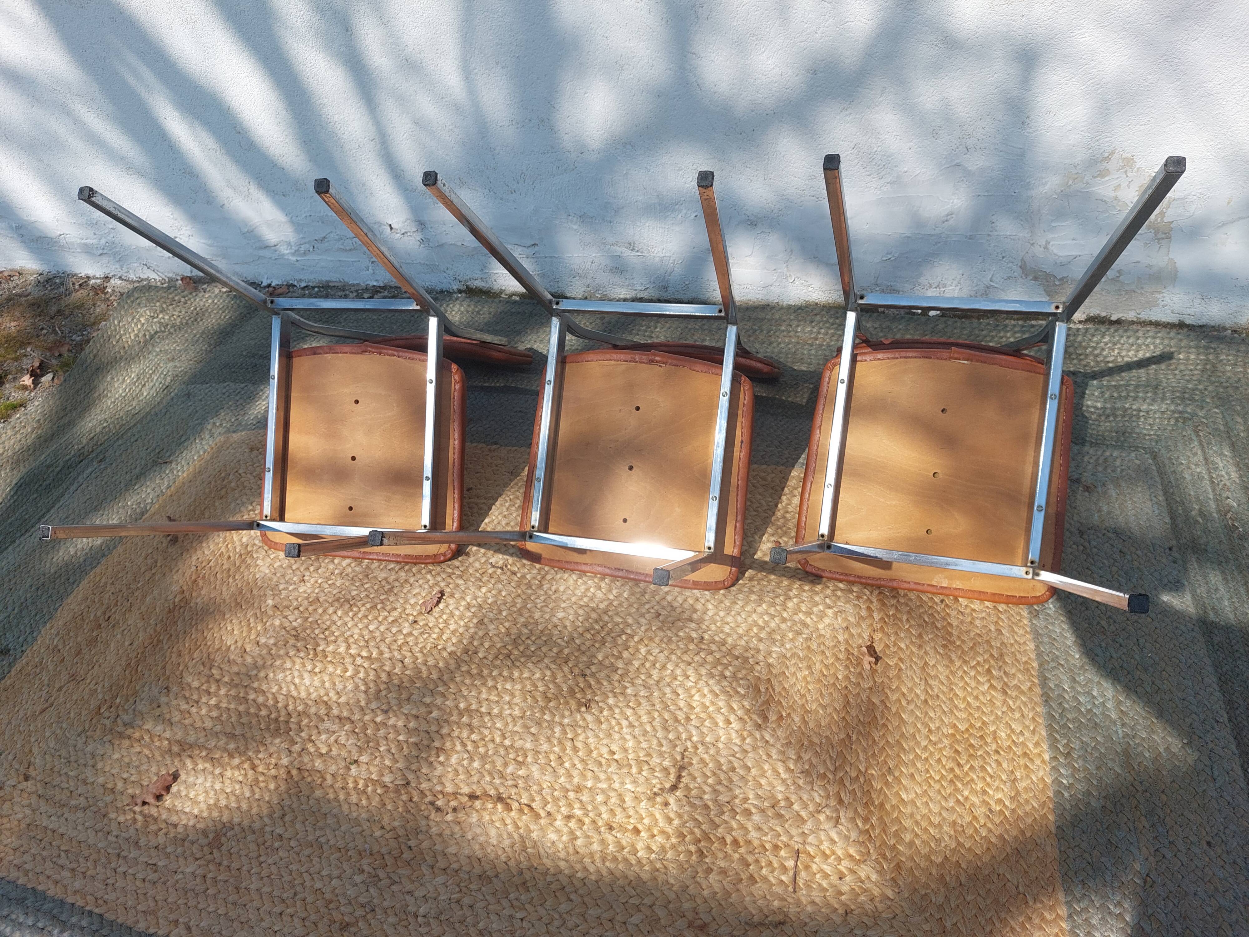 3 stainless steel tube chairs and faux leather, vintage