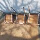 3 chaises vintage en inox et simili-cuir marron