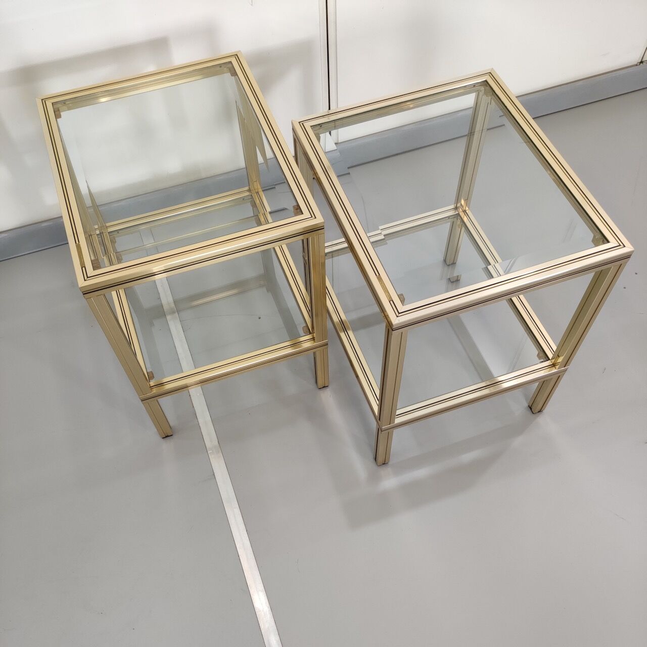 Pair gold Pierre Vandel side tables