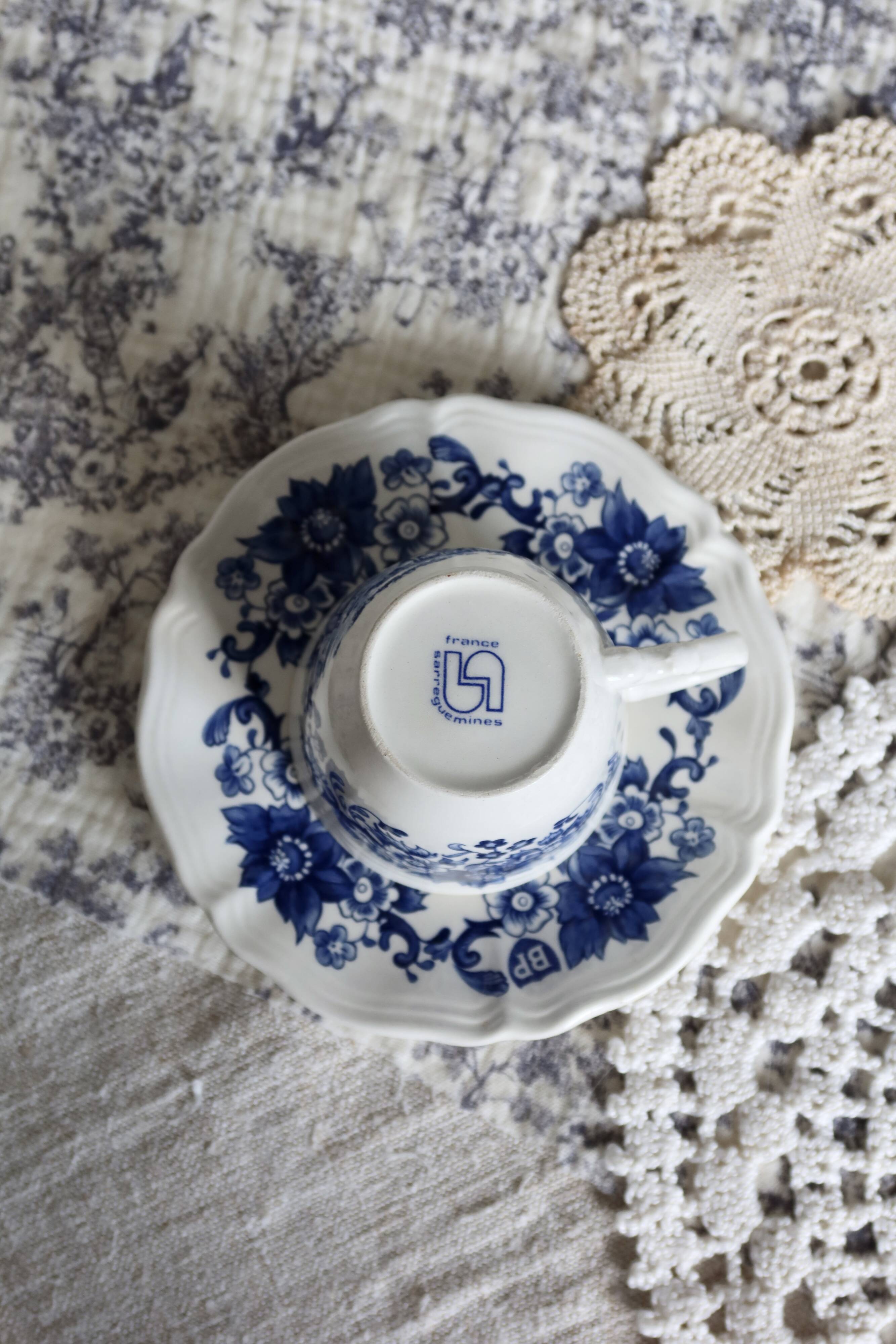 Vintage Sarreguemines cup & saucer – White earthenware with blue floral decoration