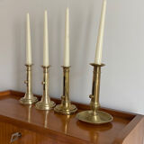 Pair of antique brass push candlesticks