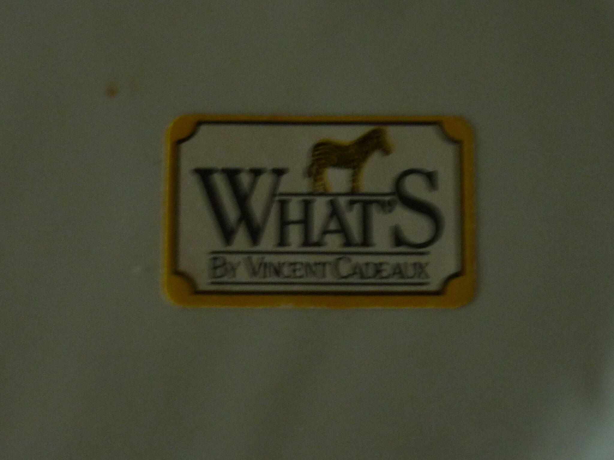 Beige ceramic vase What's