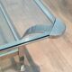 Large designer coffee table in chrome with glass tops