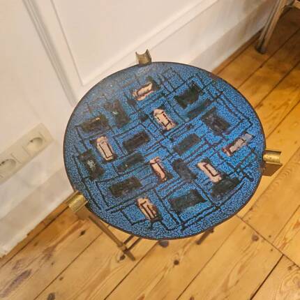 Vintage tripod metal side table with a blue brass bowl.