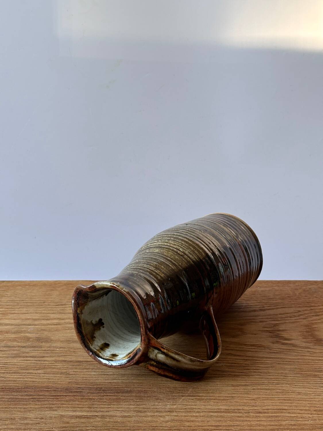 Vintage enameled stoneware pitcher