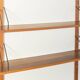 Classic shelving system from the 1950s in teak veneer by Poul Cadovius for Cado