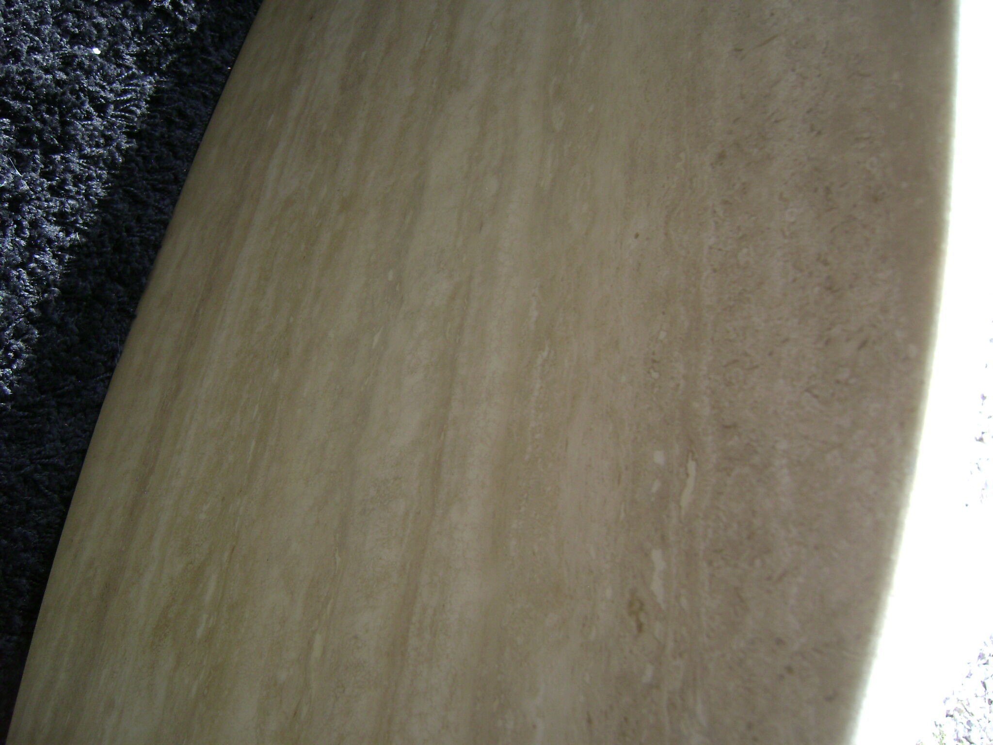 Oval coffee table in travertine italy from the 1970s