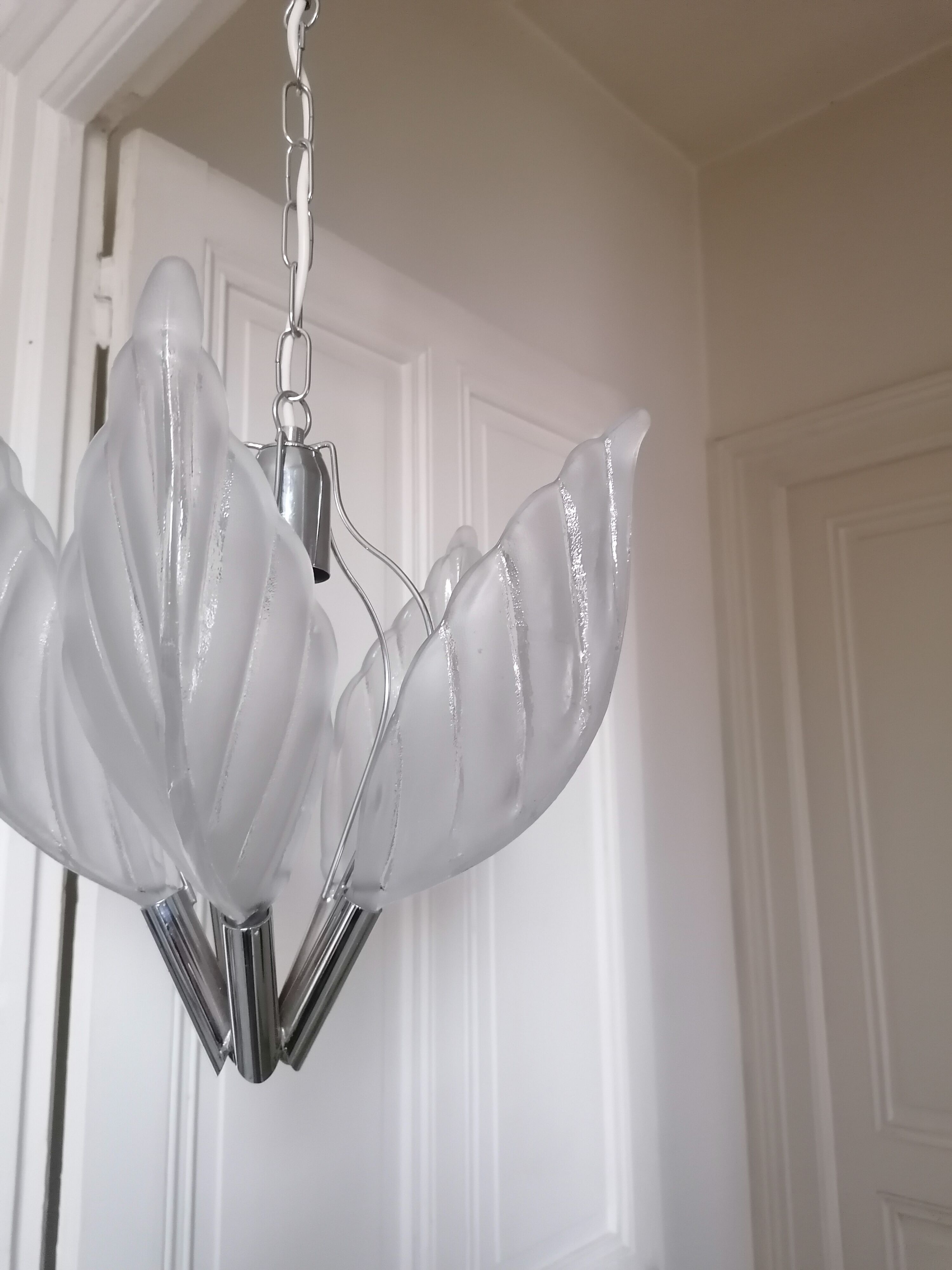 Chrome metal chandelier and glass plate