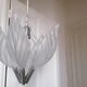 Chrome metal chandelier and glass plate