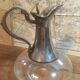 Glass and silver metal ewer