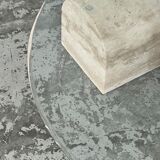 Coffee table in travertine and glass