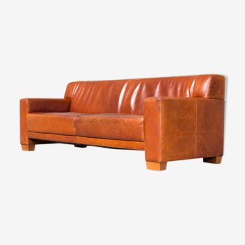 Cognac leather sofa for three