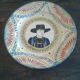 Two henriot Quimper plates