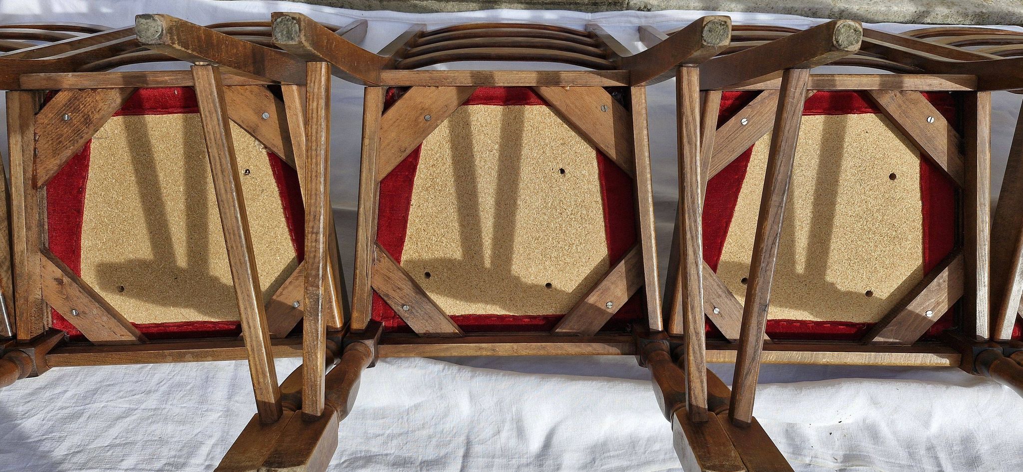 Round wooden table with 1 integrated extension + 6 wooden and fabric chairs