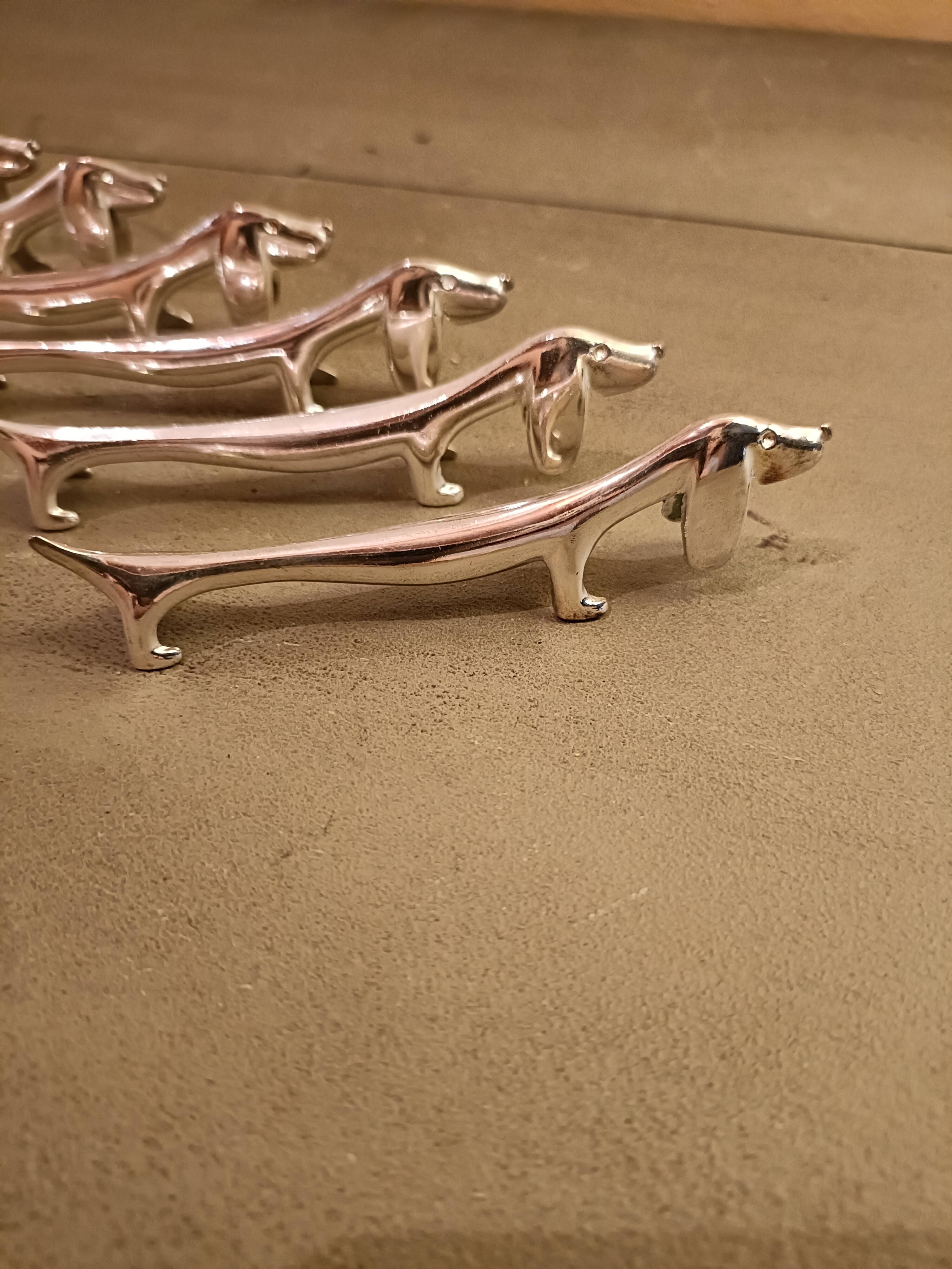 Porte couteaux métal argenté chien