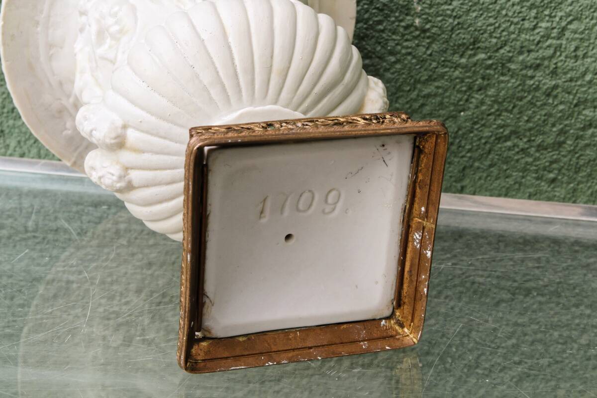 Pair of Medicis Borghese vases in porcelain biscuit and brass.