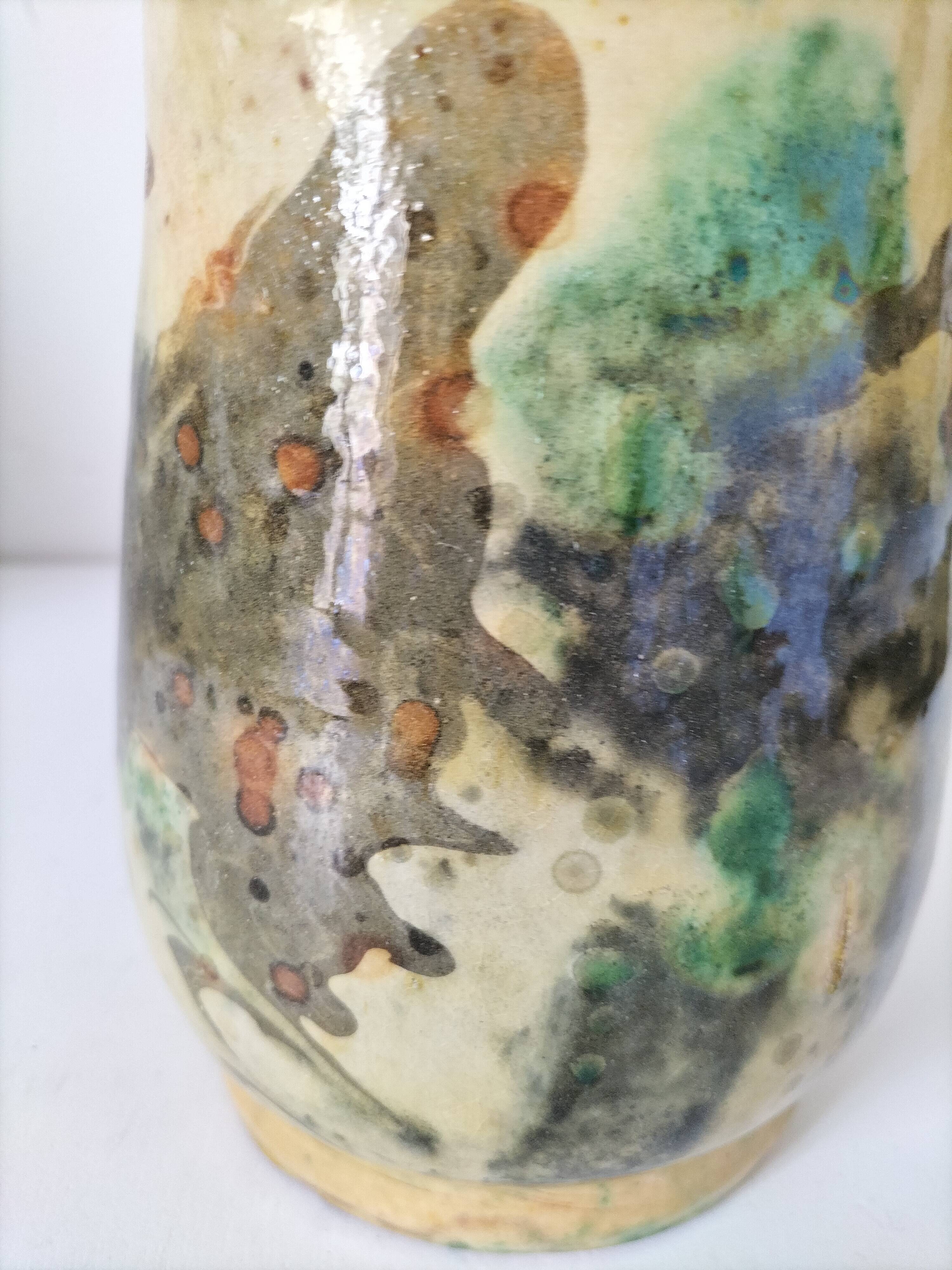Glazed earthenware pitcher with abstract polychrome decoration, handmade.