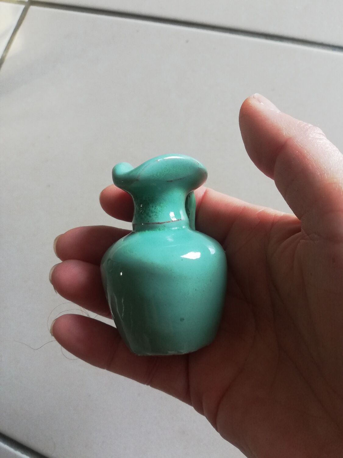 Very small turquoise soliflore in the shape of a ceramic jug