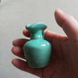 Very small turquoise soliflore in the shape of a ceramic jug