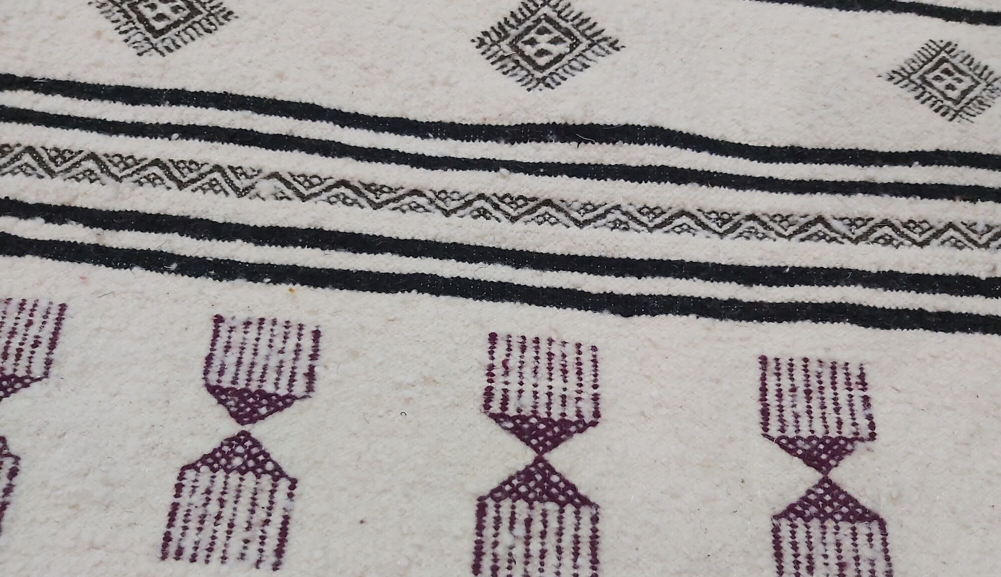 Black and purple white carpet woven by hand in pure wool
