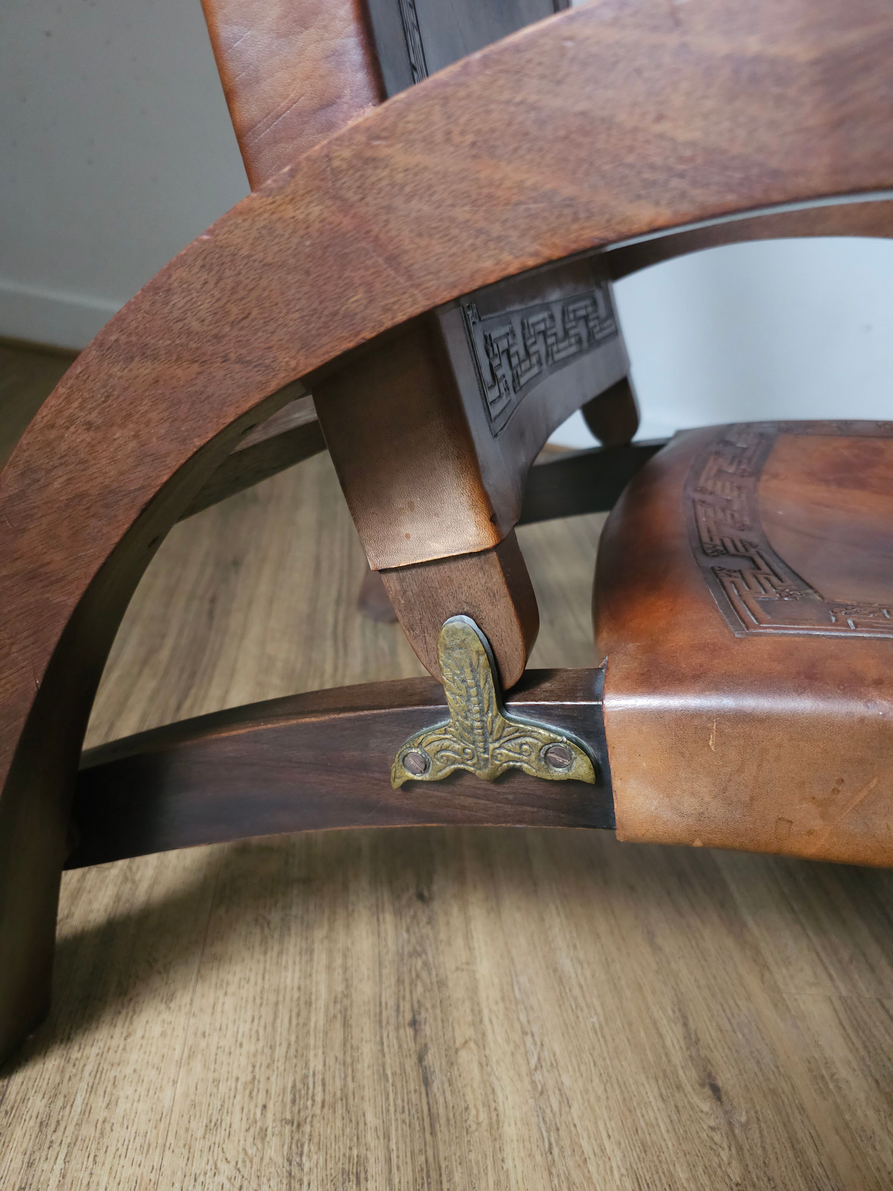 Leather and teak armchairs, by Angel Pazmino, circa 1960.
