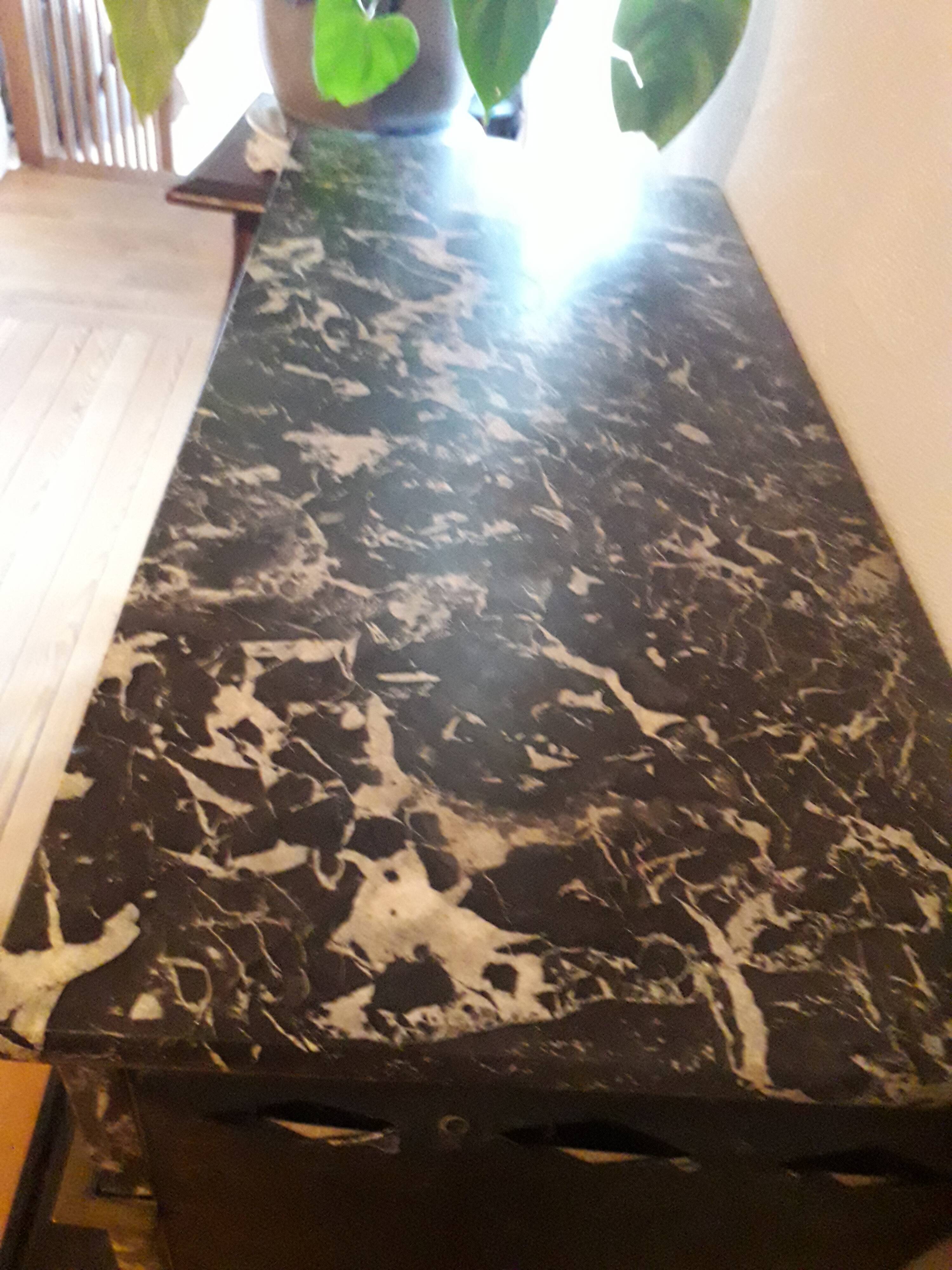 Old black marble fireplace