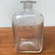 Vintage Danish glass bottle with engraving.