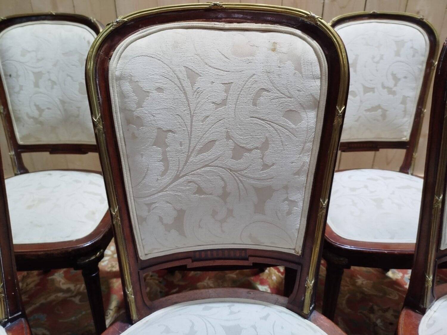 Suite de 8 chaises et paire de fauteuils Louis XVI