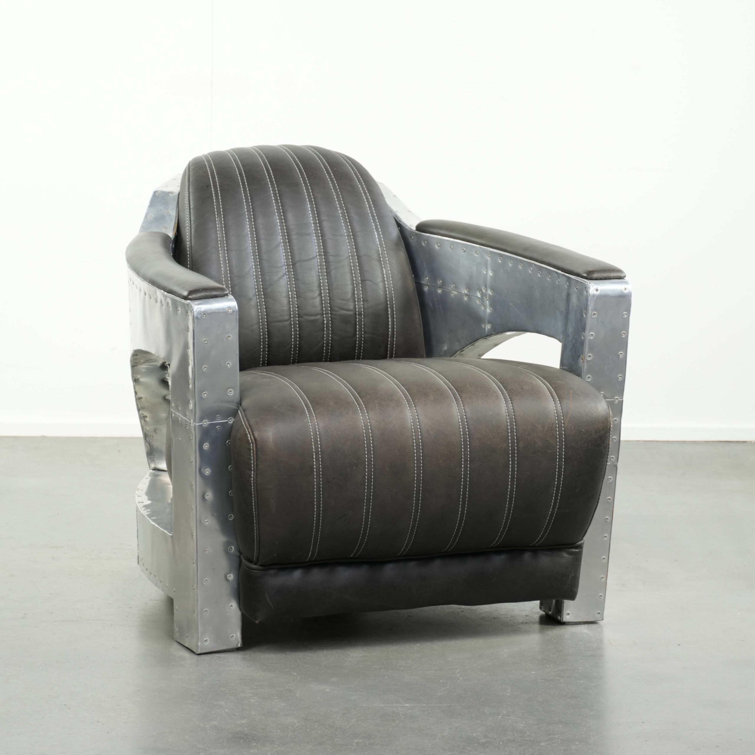 Comfortable cow leather aviator design armchair finished with aluminium