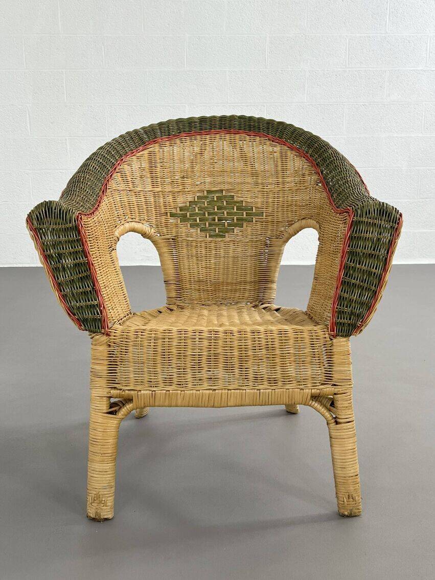 Rattan, wicker and green and red edging cabriolet style armchair