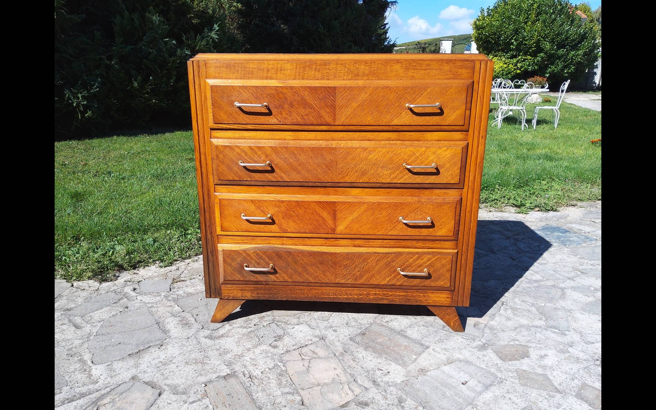 Compass leg chest of drawers