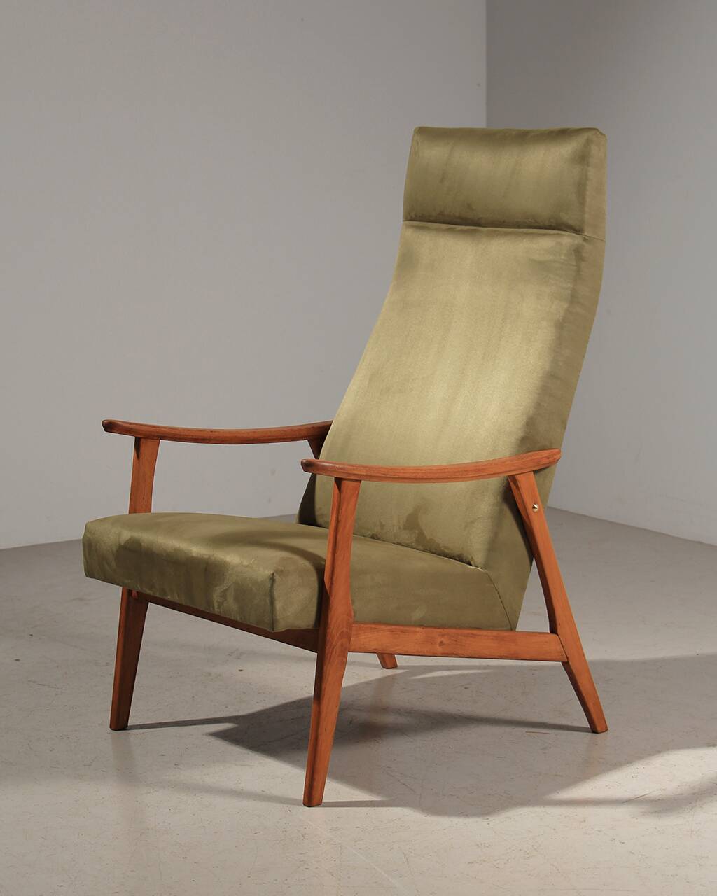 Vintage green velvet armchair