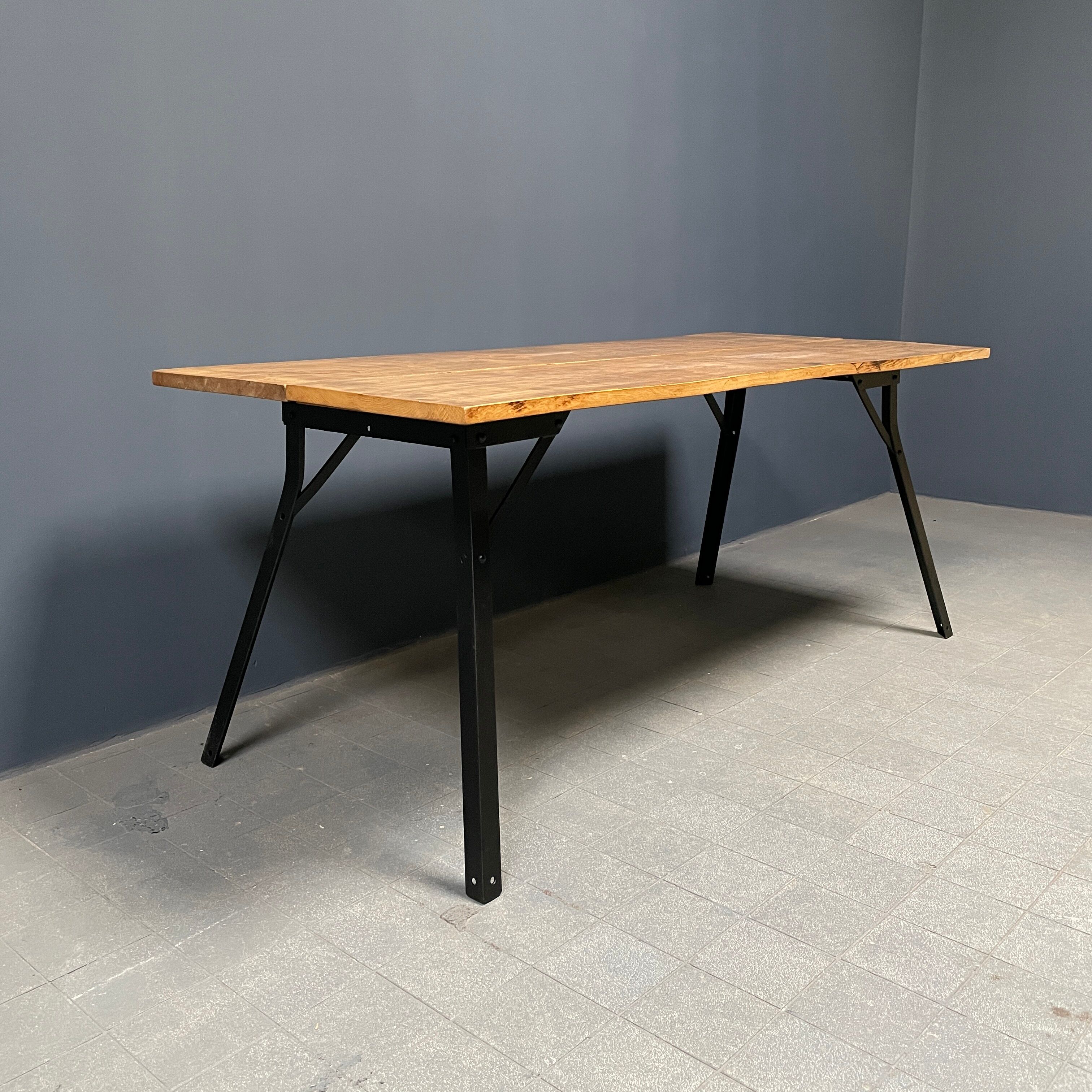 Handmade industrial oak dining table with black metal legs