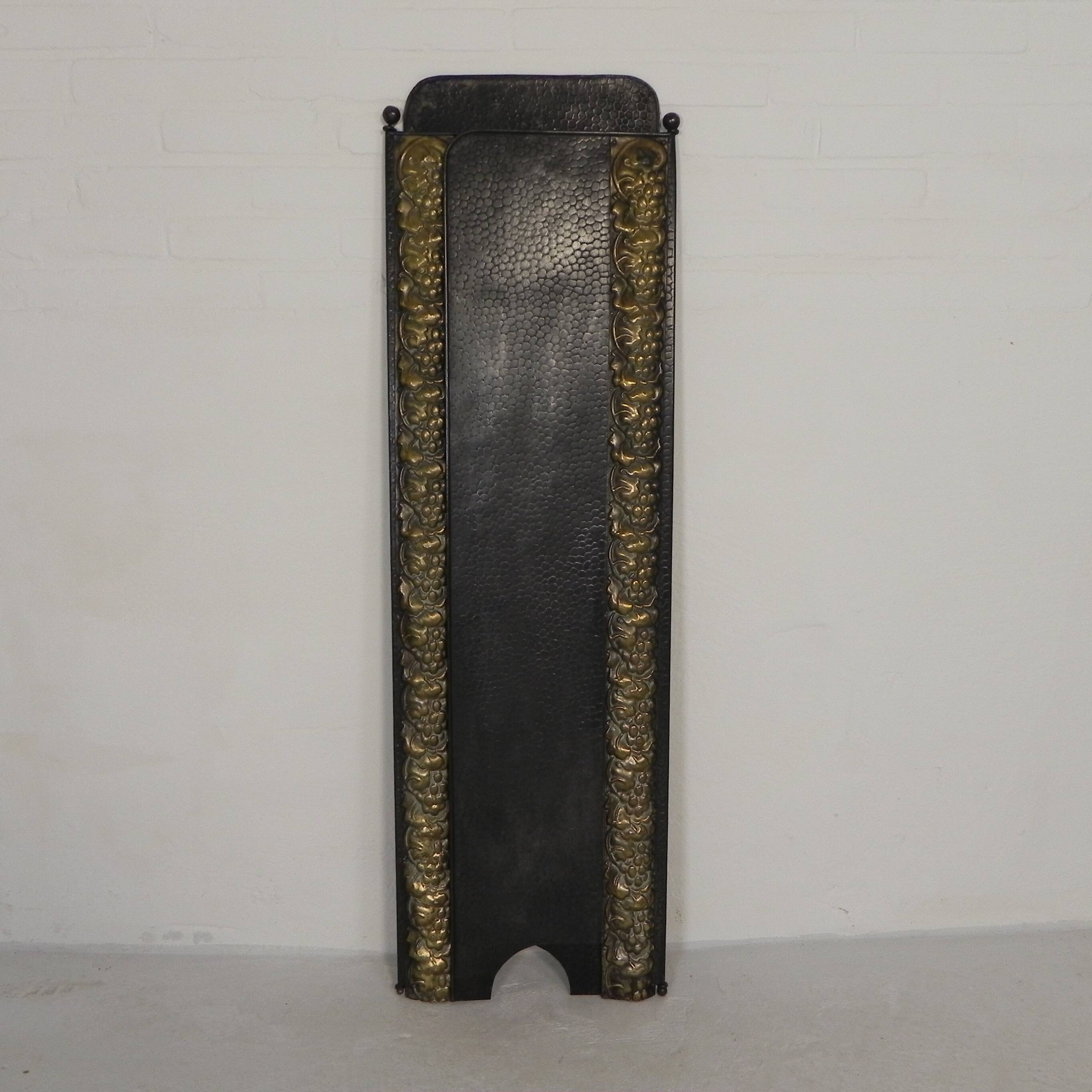 Art Deco screen in steel with brass details, 1930s.