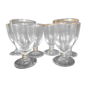 Set of 6 glasses with golden digestive liquor