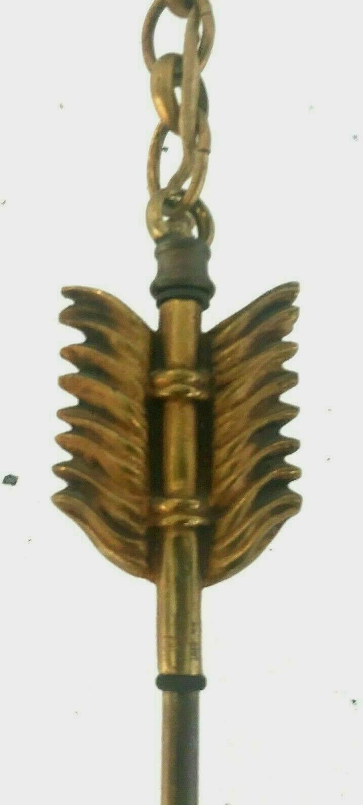 Empire-style chandelier has double patina