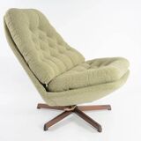 Green swivel Scandinavian armchair
