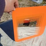 Vintage orange glass mirror