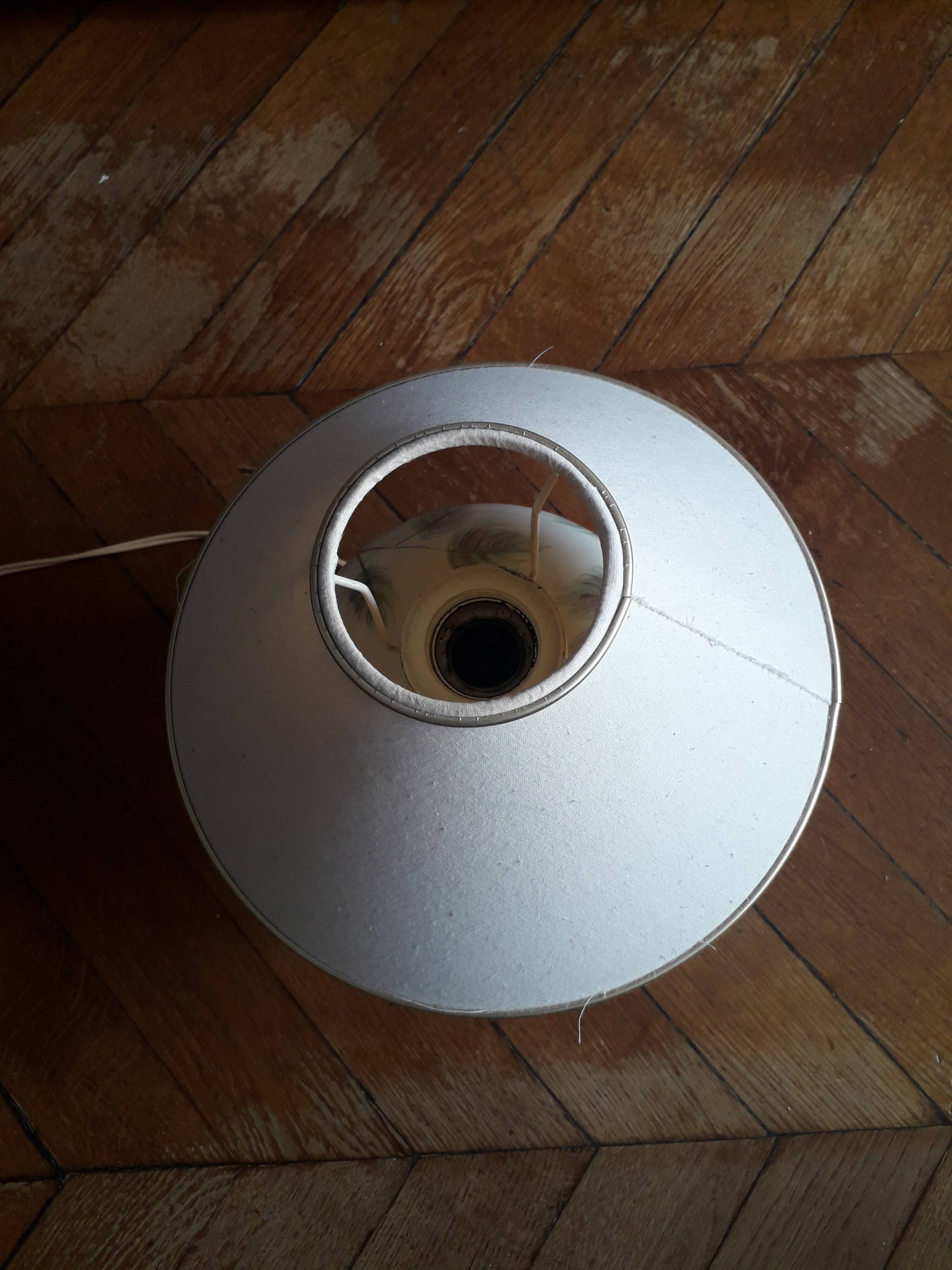 Antique ceramic lamp with floral decoration